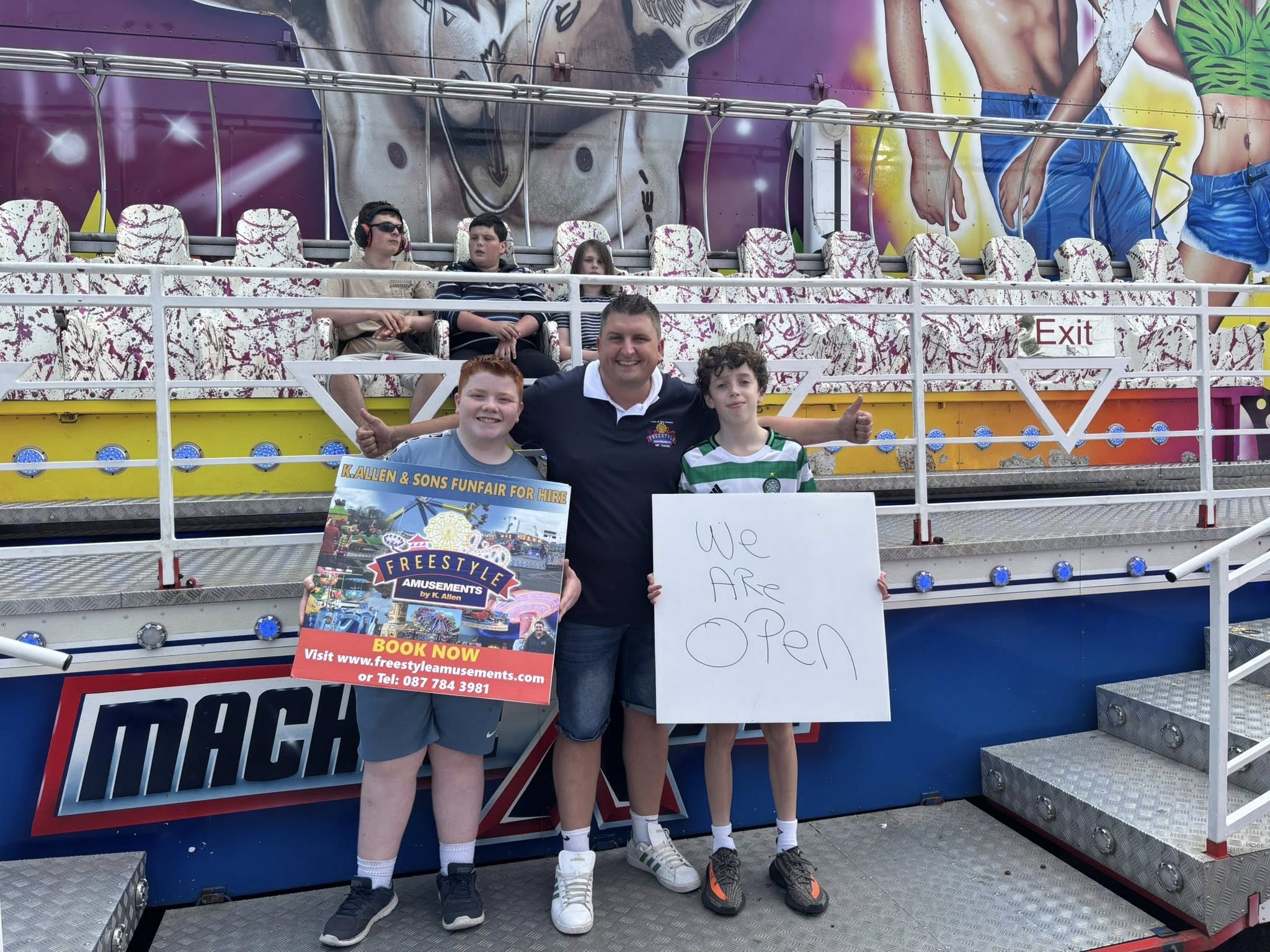 Killian Allen with children at a Freestyle Amusements funfair