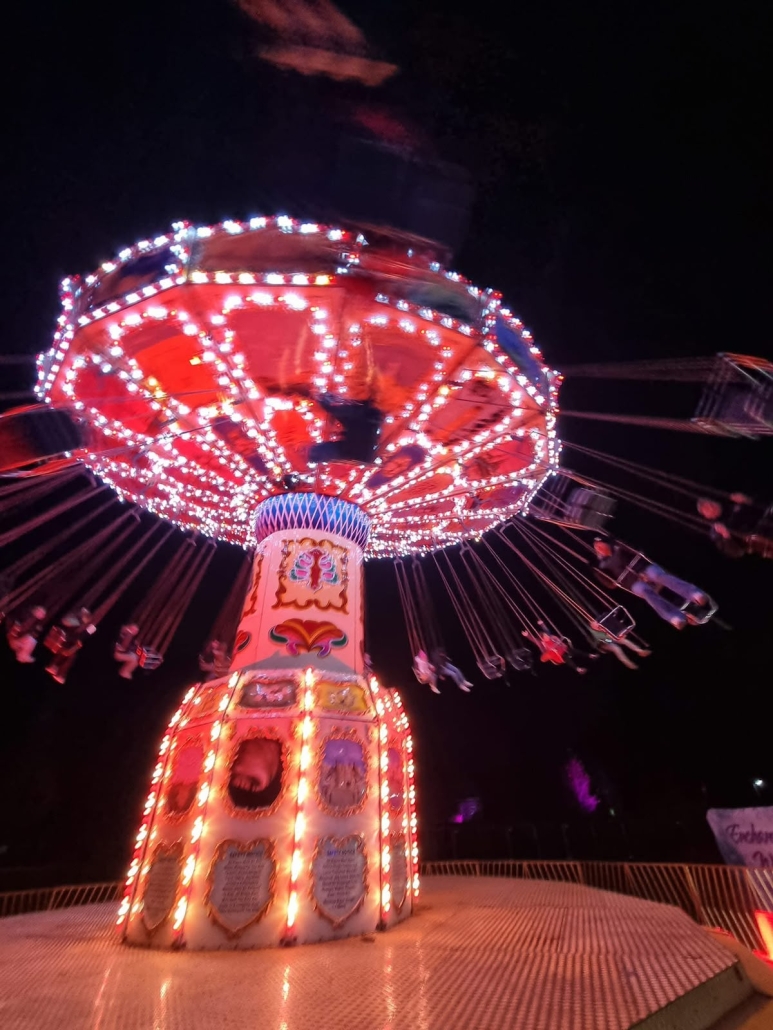 Chair-O-Planes at a Freestyle Amusements fairground event